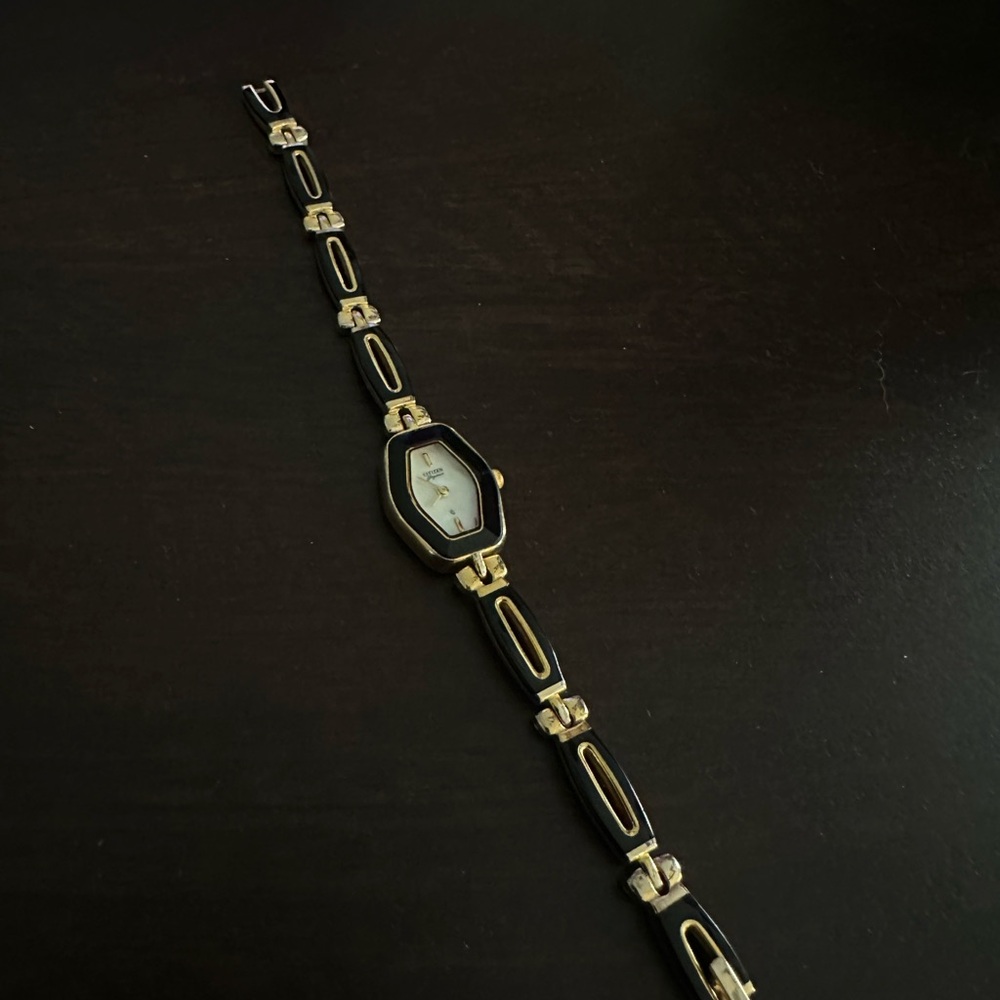 Elegant Black and Gold Watch